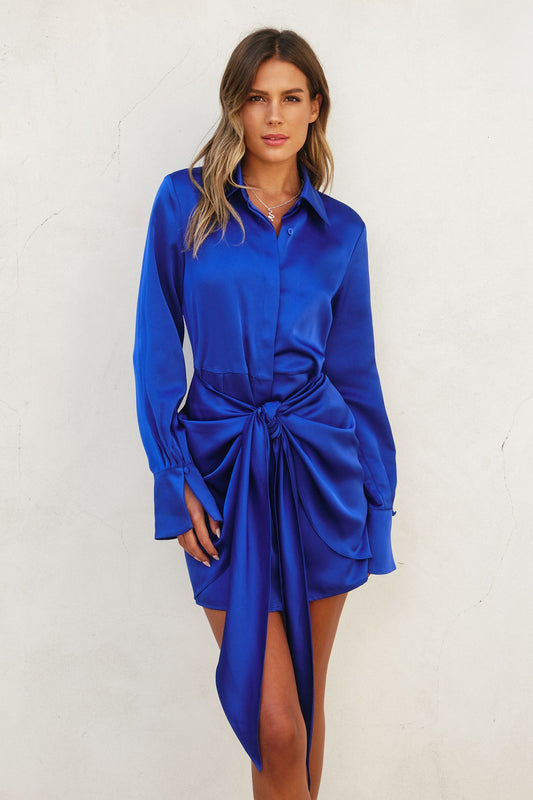 Royal Blue satin shirtdress with front-tie waist and flared sleeves, showcasing an ocean-inspired elegant look.