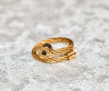 Gold cuff bracelet with ring